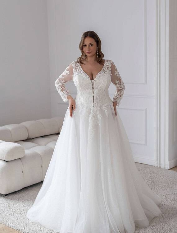 Honeymoonshop trouwjurk met kanten details, winkel, trouwjurken, trouwpakken.