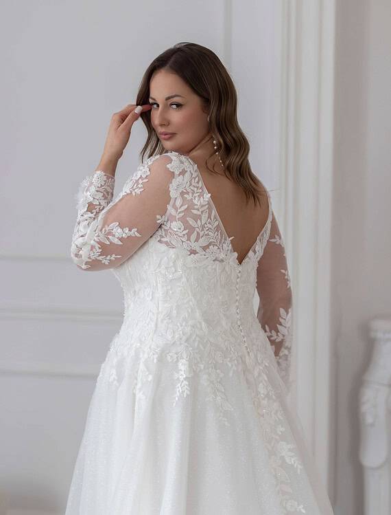 Honeymoonshop, winkel, trouwjurken, trouwpakken, elegante trouwjurk.