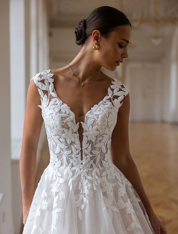 Honeymoonshop, winkel, trouwjurken, trouwpakken, elegante trouwjurk.