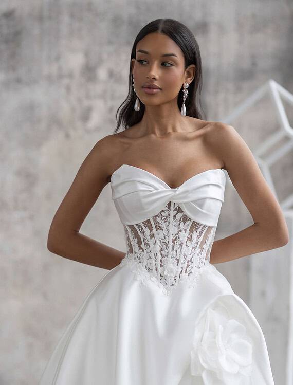 Honeymoonshop, winkel, trouwjurken, trouwpakken, elegante trouwjurk.
