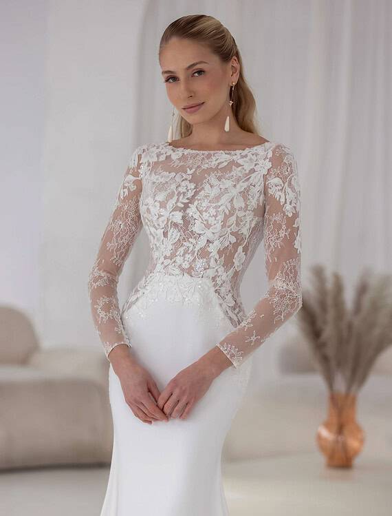 Honeymoonshop, winkel, trouwjurken, trouwpakken - Elegante trouwjurk met kanten top.