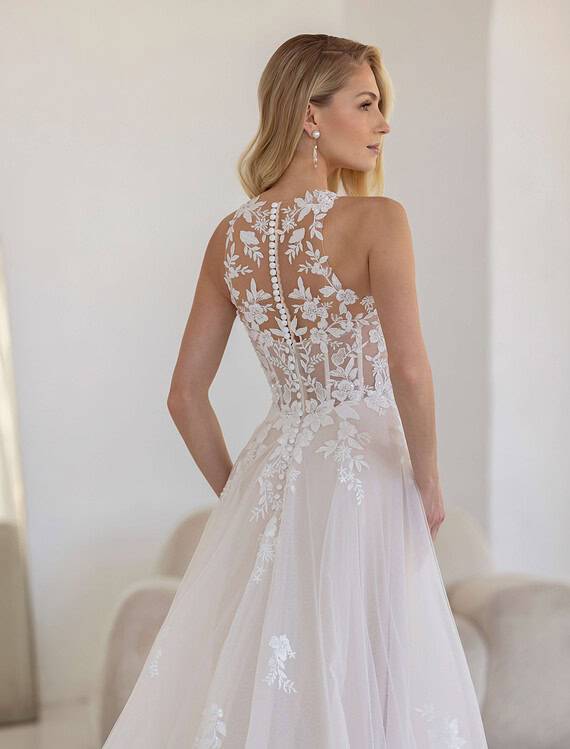 Honeymoonshop, winkel, trouwjurken, trouwpakken - elegante trouwjurk met kanten details.